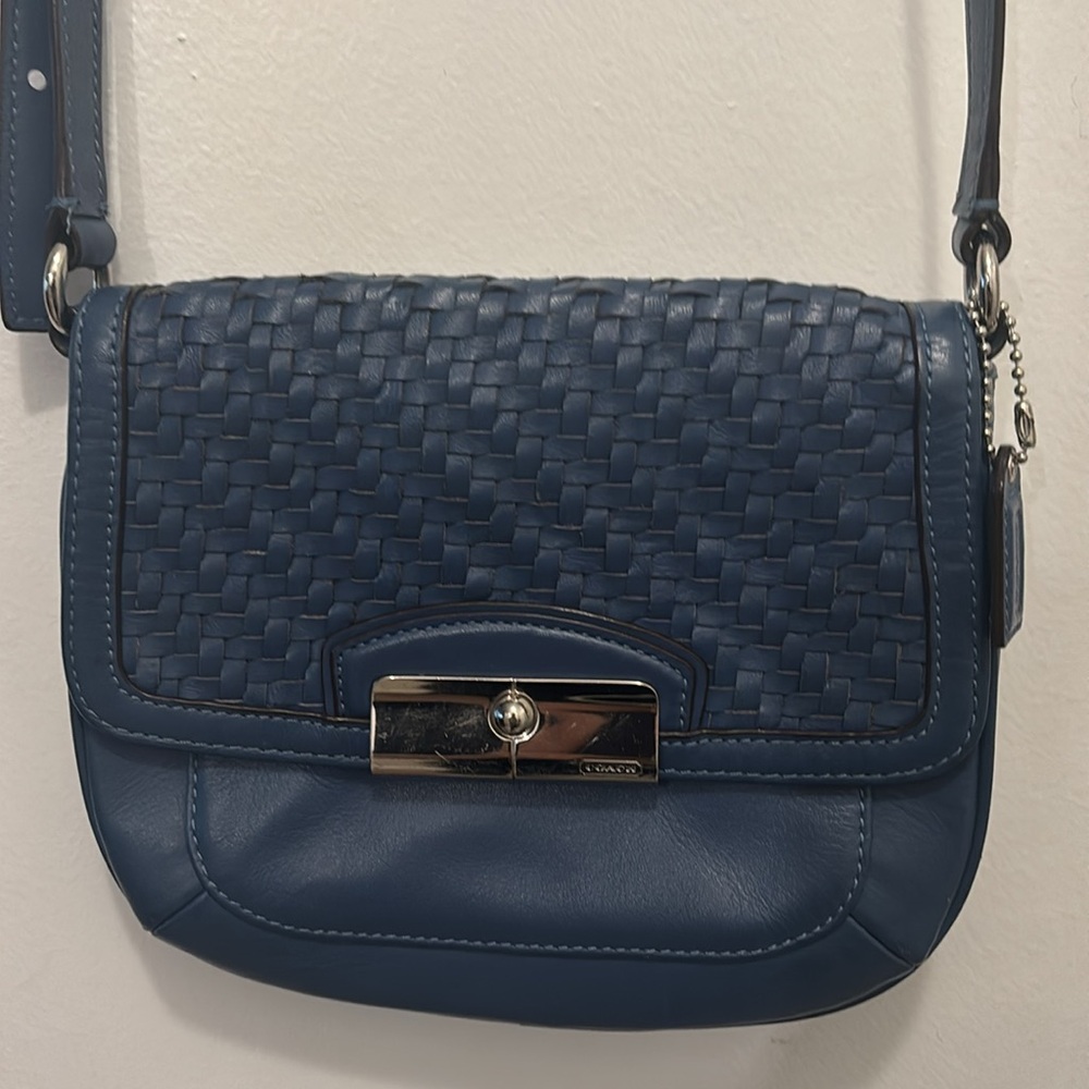 Elegant Blue Coach Crossbody Bag with magnetic clasp, adjustable able strap